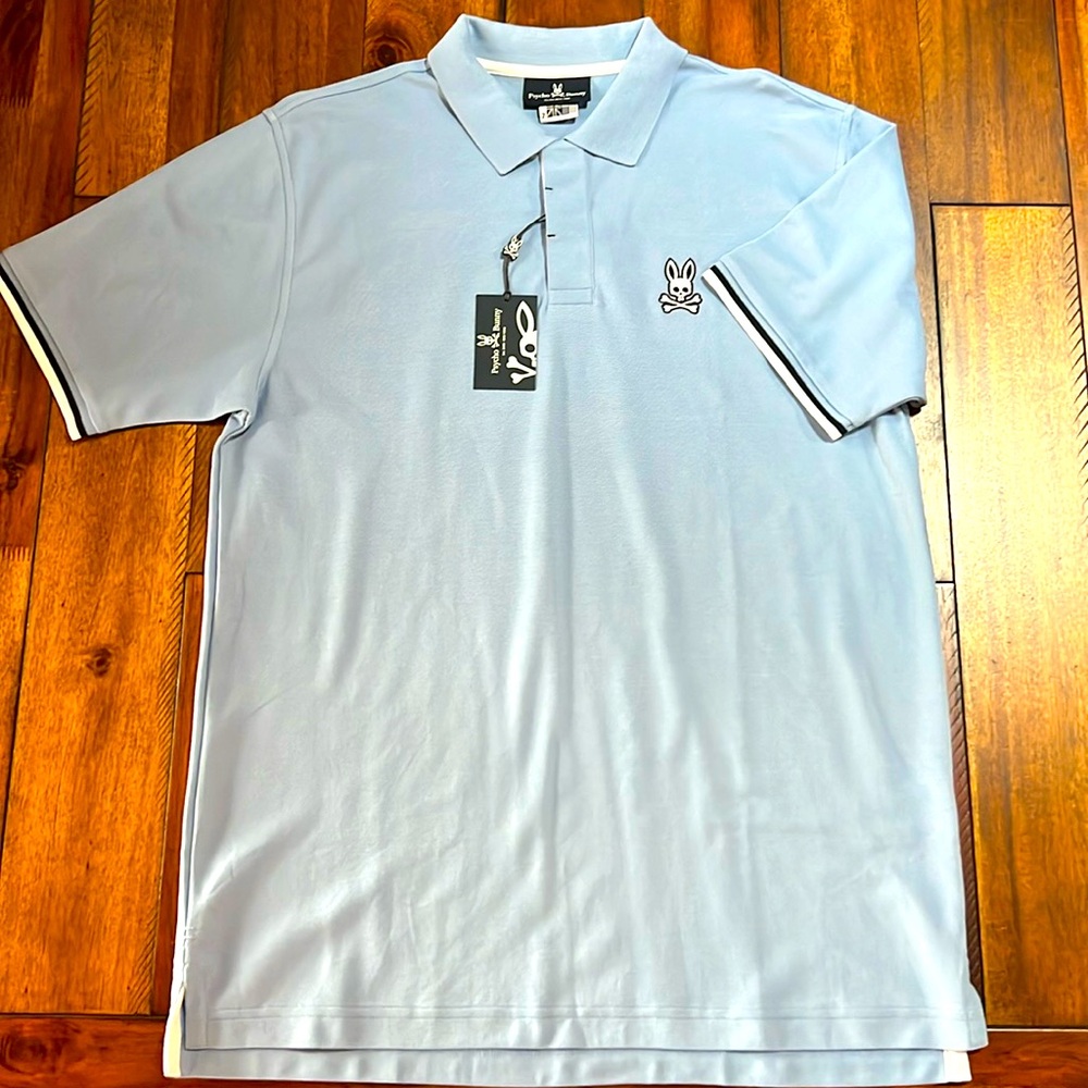 Psycho Bunny NWT Men’s polo shirt size 7 UK Light Blue, navy/white accents